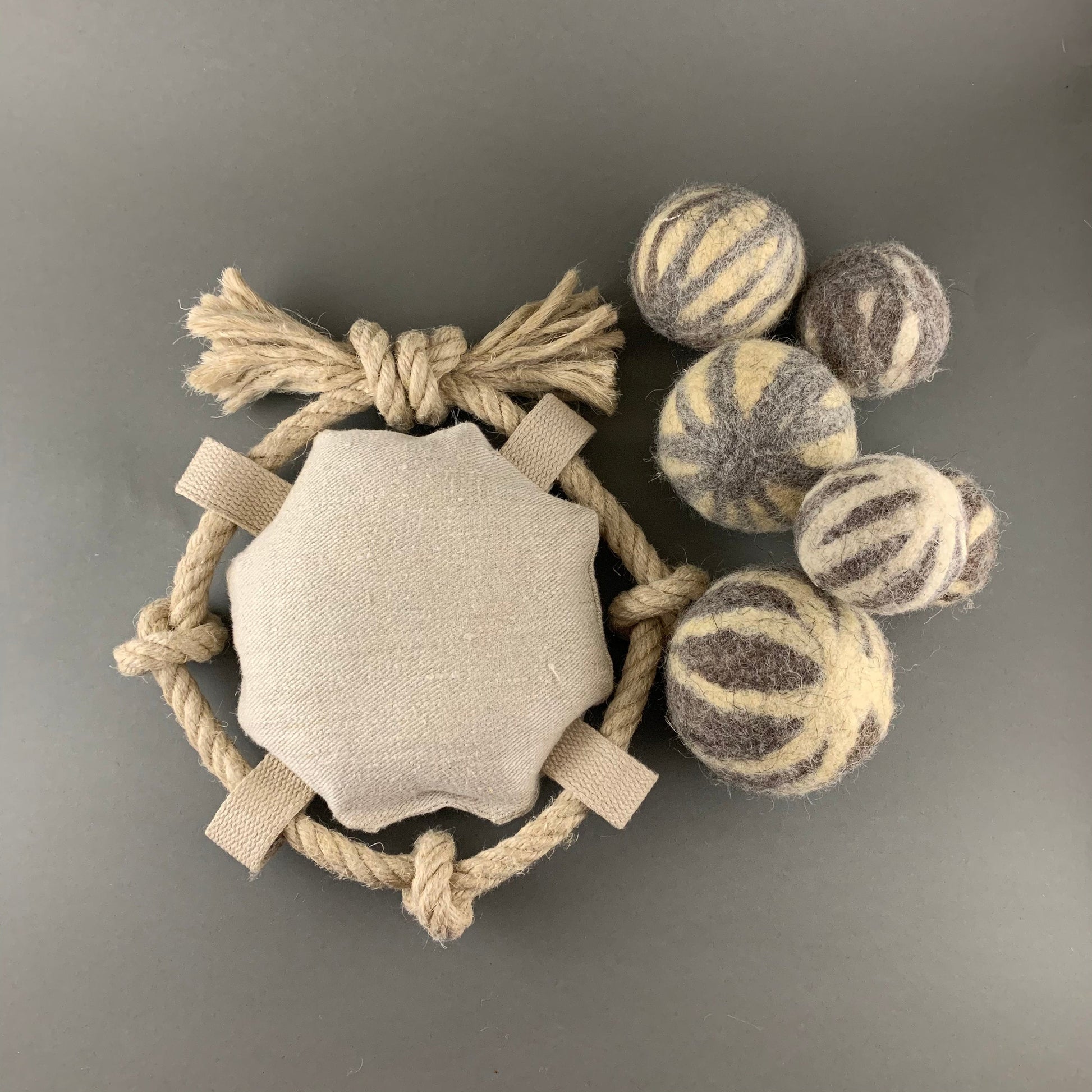 dog fetch toy with pile of wool balls